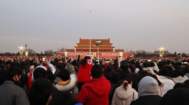 国庆假期你会去北京看升旗吗英文