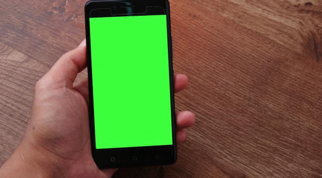 手机屏幕出现一个绿点怎么办