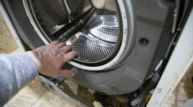 洗衣机怎么拆开内桶清洗