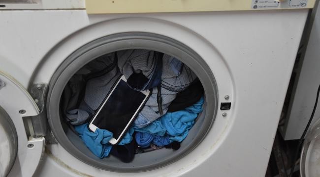 全自动洗衣机新买的里面有水吗怎么办
