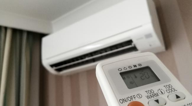 挂壁空调手动调温度怎么调的