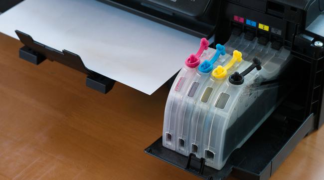 打印机卖家为啥要改装墨盒呢
