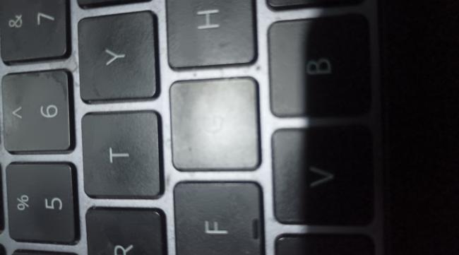 笔记本电脑按键乱跳怎么解决